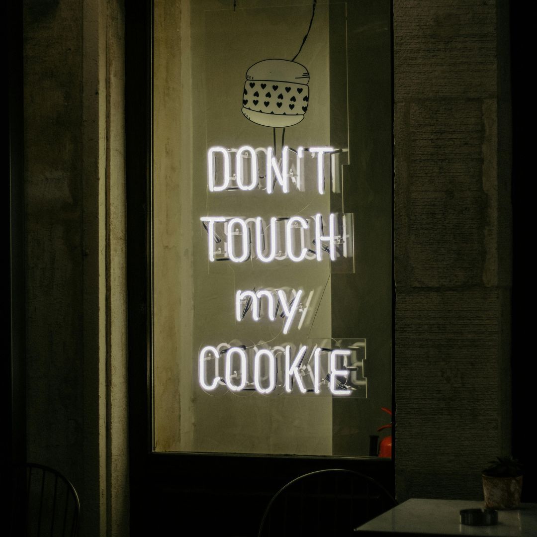 Neon sign with the word 'Neonific' on a dark background